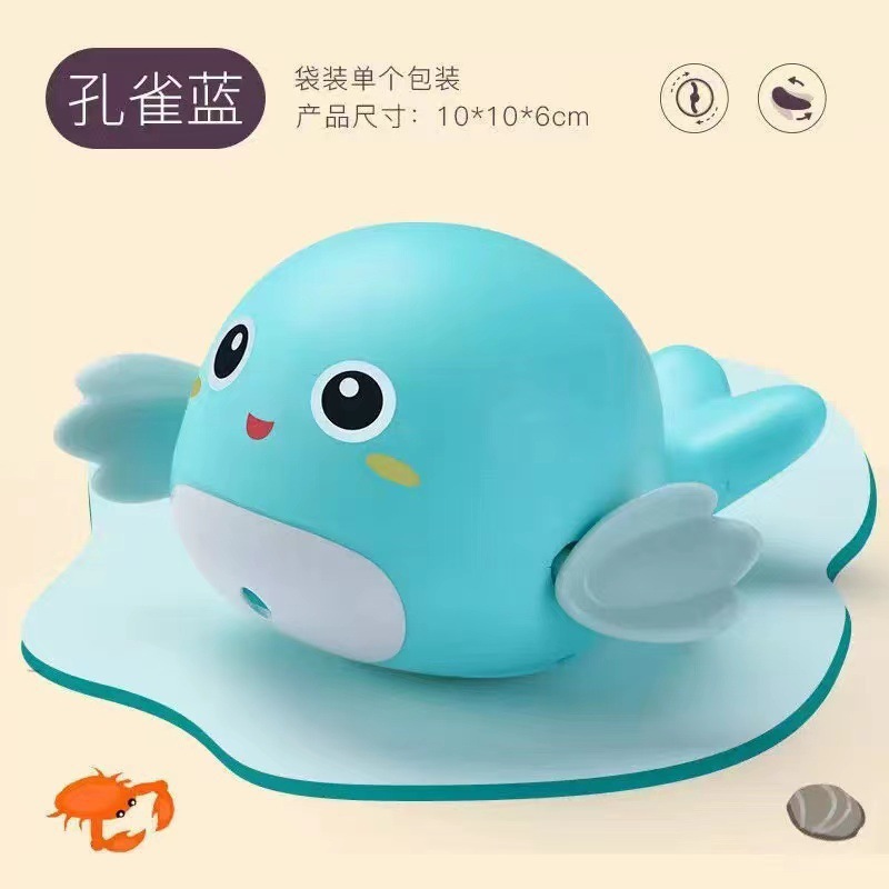 Green dolphins playing in water