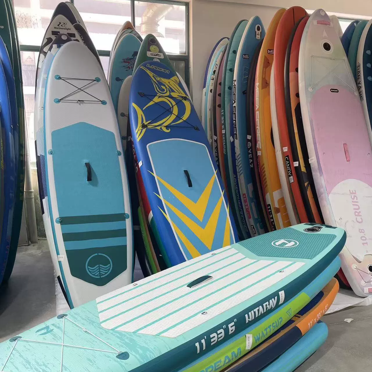 Inflatable stand‑up paddle board (Favorite) — thickened racing SUP, multiple designs, some sets include accessories