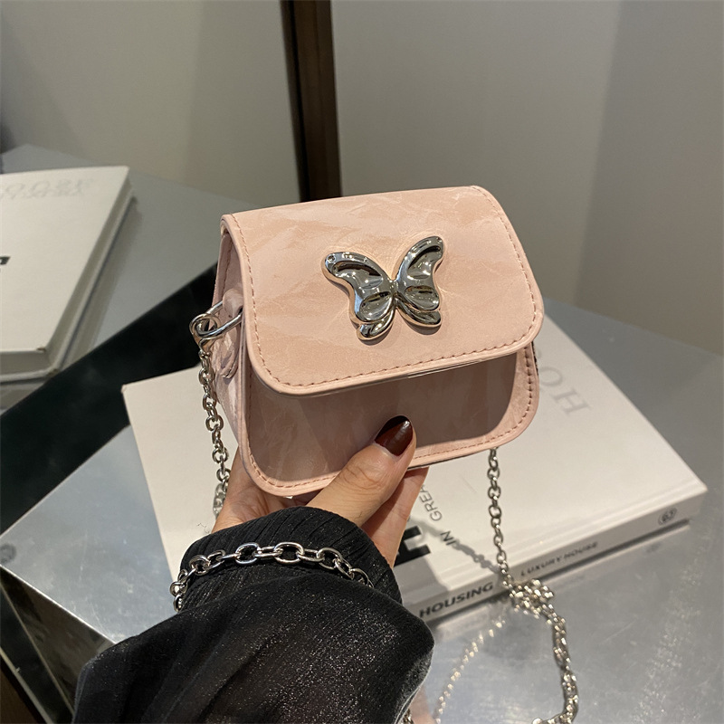 Bolso de fuego para mujeres 2024 nueva cadena bolso de mochila versátil exquisito viento de verano mini bolso plateado