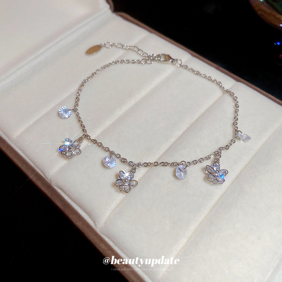 Colgante de flor redonda de circón tobillera para mujer, lujo ligero, sentido de alta gama, anillo de pie, nicho, moda simple, accesorios de pie de todo fósforo al por mayor