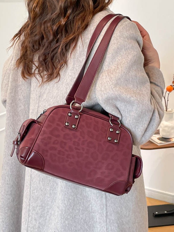 Bolsos de gran capacidad de alta sensación para mujeres 2026 retrógrado leopardo nicho de diseño bolsas de bolos de viaje simple bolsa de tote image 3