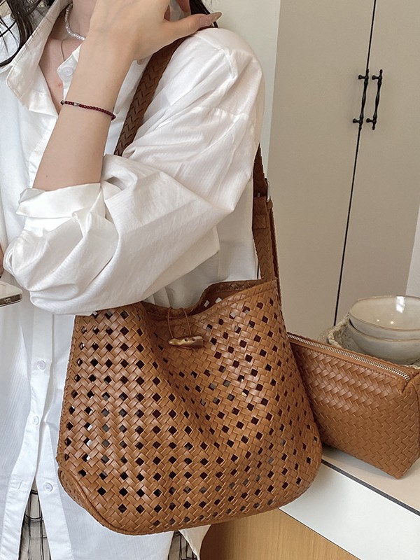 Bolsa de tejido hueco de gran capacidad para mujeres 2026 verano nuevo estilo coreano simple bolso de brazo de viaje bolsa de ocio