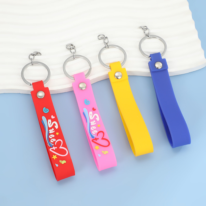 Color soft rubber leather rope keychain accessories cartoon letters couple key ring hand strap pvc key chain wristband Color soft rubber leather rope keychain accessories cartoon letters couple key ring hand strap pvc key chain wristband