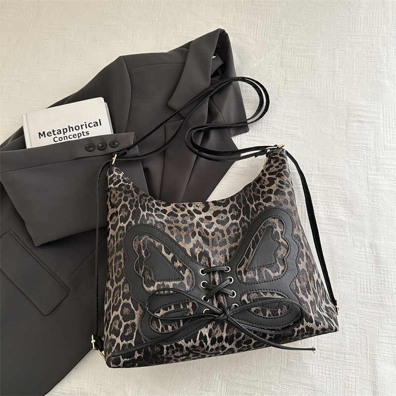 Bolso Tote con estampado de leopardo de moda Bolso de hombro de gran capacidad de moda de otoño e invierno de alta gama Bolso femenino de diseño 2025 Bolso retro