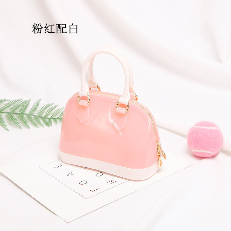 2025 primavera y verano estilo caliente moda casual niños dulces bolsa de gelatina mini bolso de mensajero de un solo hombro variedad al por mayor