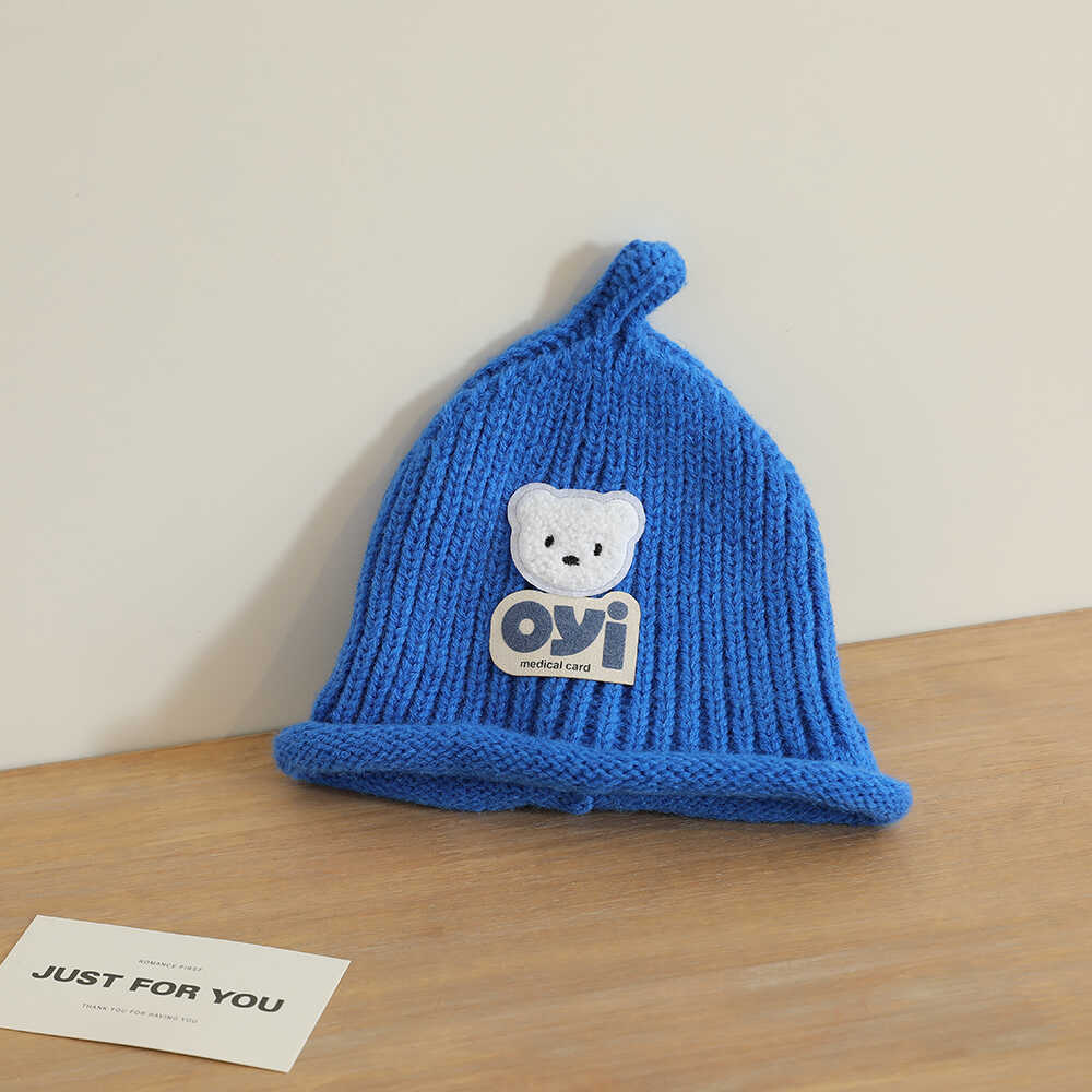 2024 otoño y invierno nuevo unisex lindo sombrero de punto de cabeza de oso simple sombrero de lana casual universal