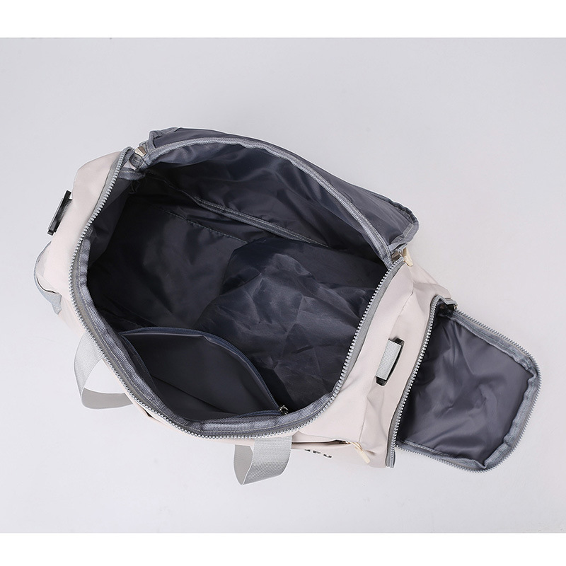 Nueva bolsa de viaje portátil transfronteriza, bolsa de almacenamiento de equipaje de viaje de viaje de corta distancia, bolsa de yoga de entrenamiento deportivo para mujer