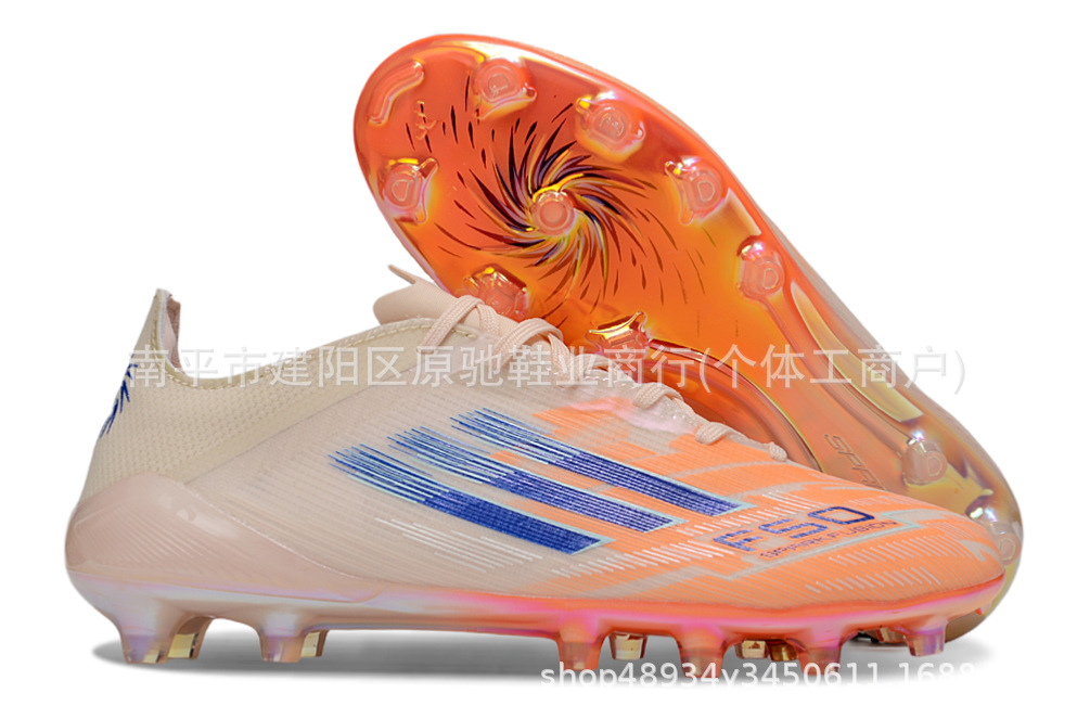 Fábrica de Putian al por mayor F50 zapatos de fútbol FG zapatos con lengua baja zapatos de fútbol hombres