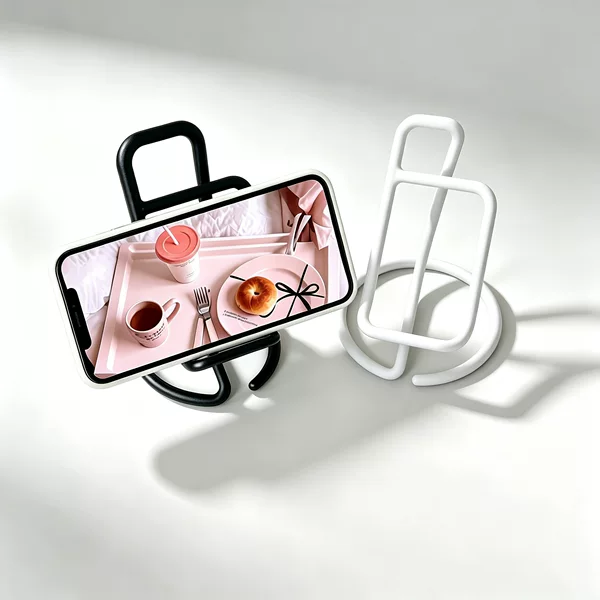 Metallic round wire one-piece mobile phone stand, non-slip, creative iron art, portable tabletop shelf