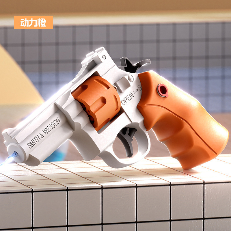新しいグロックの水鉄砲の子供のおもちゃは水を噴きます。|undefined