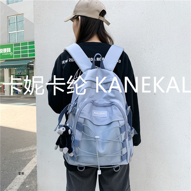 Personalidad de la tendencia de la mochila escolar de cuerda cruzada para estudiantes universitarias coreanas ins estilo japonés de la universidad Kanika Kanekalon