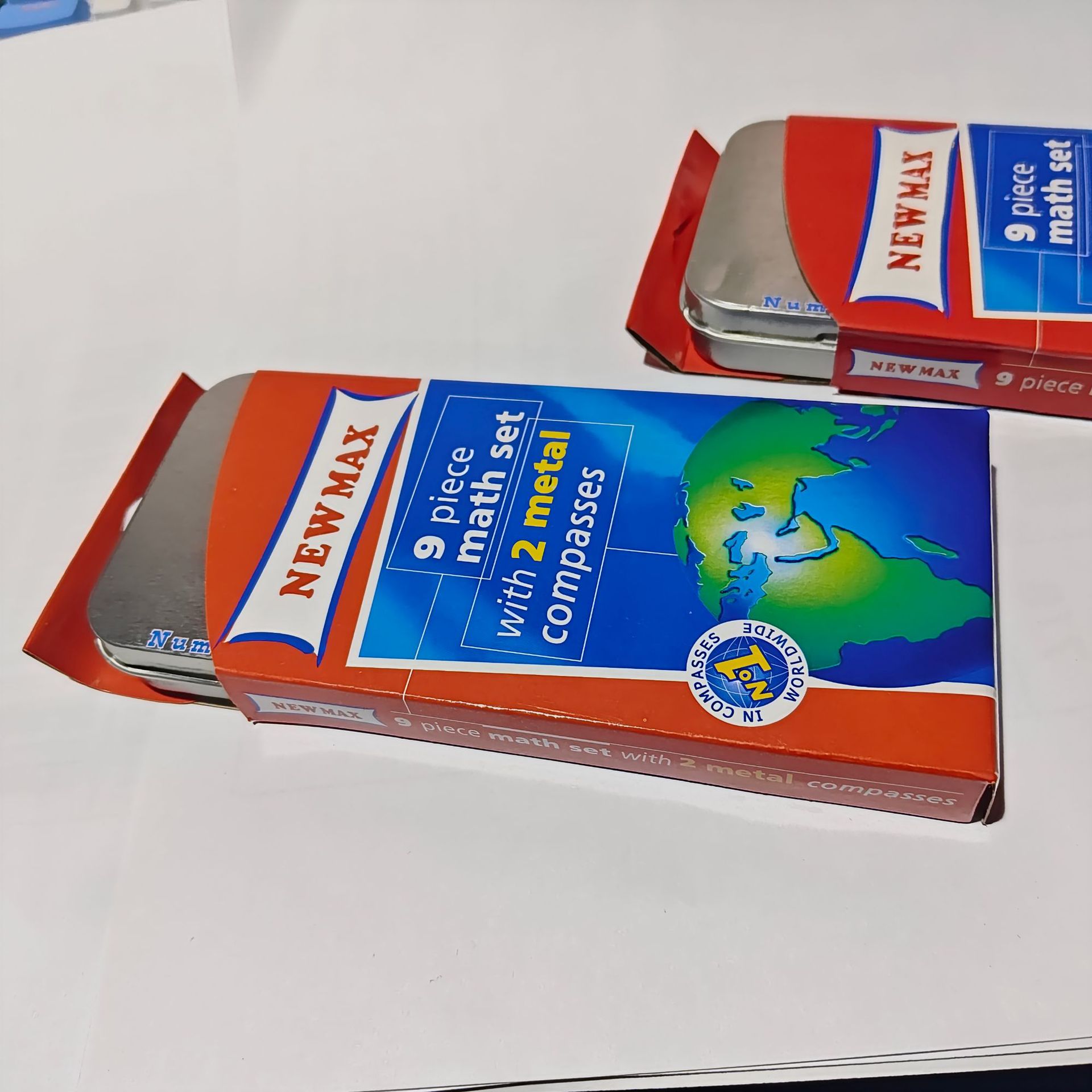 Papelería transfronteriza caja de estaño conjunto de brújulas estudiantes 9 piezas conjunto de brújulas triangular medidor de ángulo pequeña regla recta