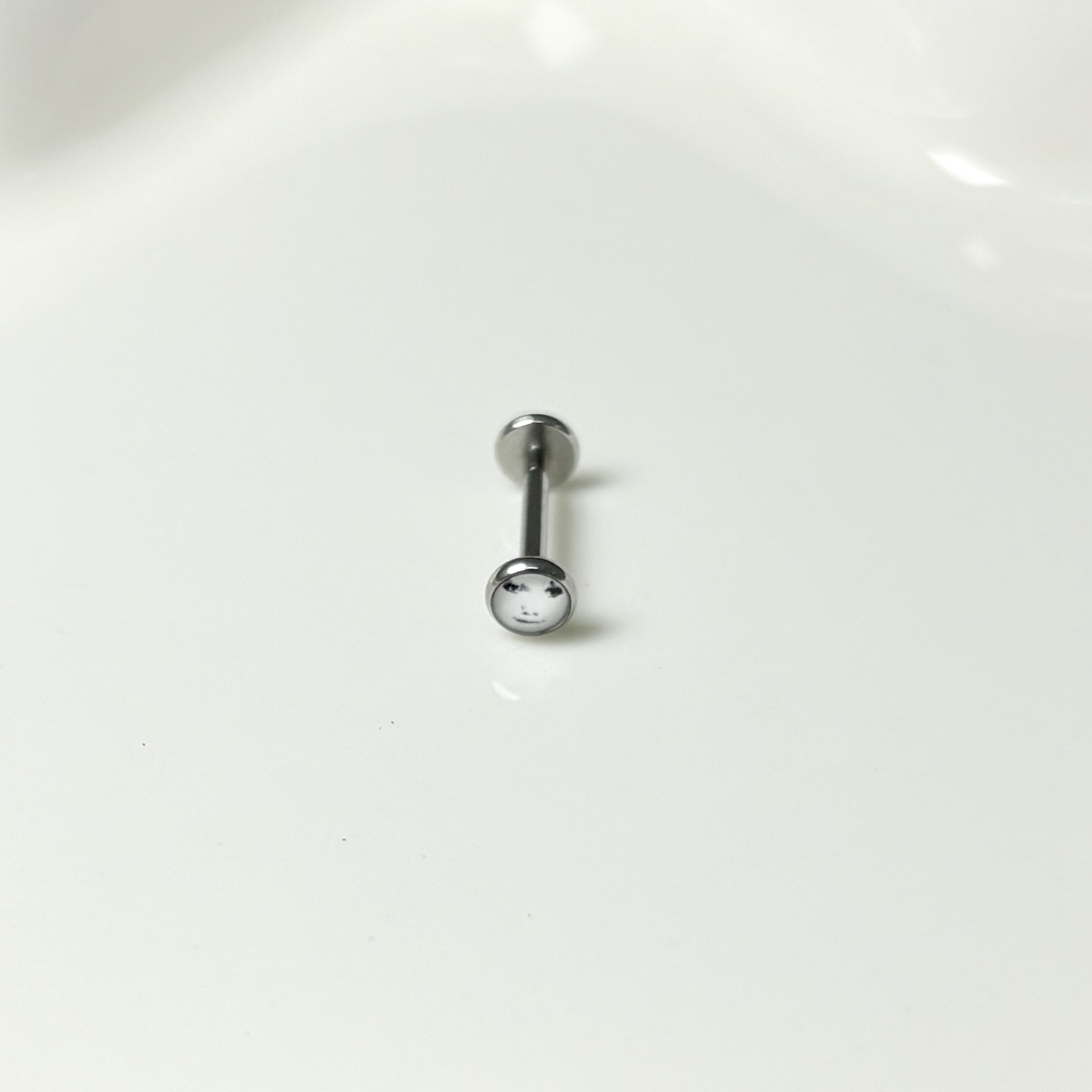 Labret stud lip piercing jewelry styling detail