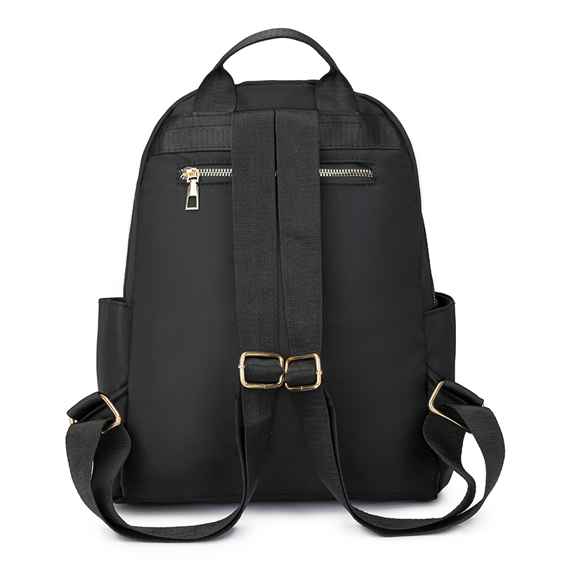 Mochila de tela Oxford para mujer 2024 nueva moda mochila de todo fósforo diseño de nicho mochila de viaje de viaje