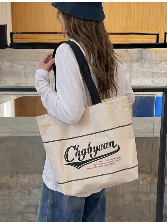 Bolsa de lona para mujeres 2026 nueva bolsa de hombro portátil simple y versátil bolsa de viaje de clase diaria