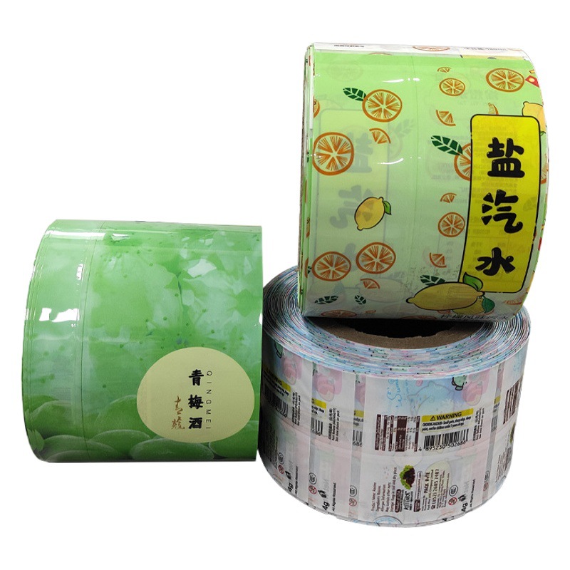 Película de etiqueta de impresión Película Termocontraíble Impresión en color Botella de vino de bebidas Película de etiqueta Proteína en polvo Embalaje de plástico Película de sellado Rollo de película