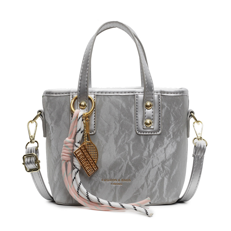 Comercio exterior explosión bolso de cubo de mano mujer 2025 nuevo simple bolso de hombro casual red explosión bolso de mochila coreano