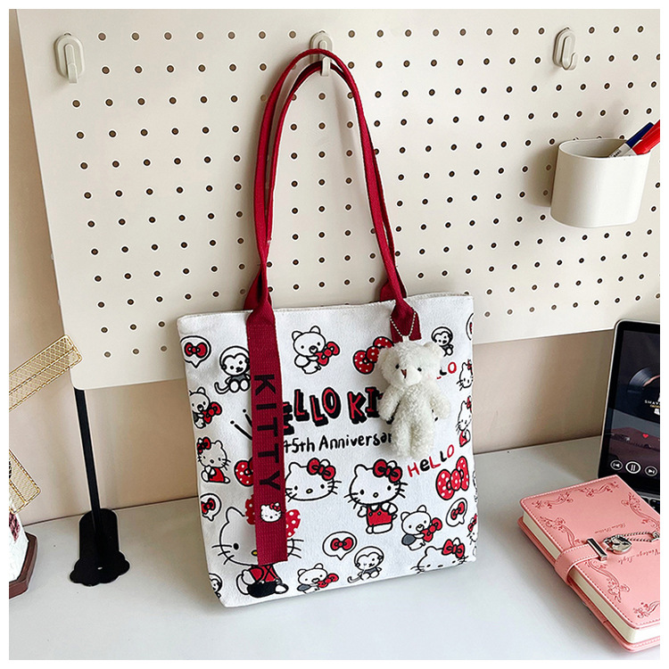 The new fashionable cartoon canvas bag, simple and versatile tote bag, cute commuting single-shoulder tote large bag, is selling well across borders undefined