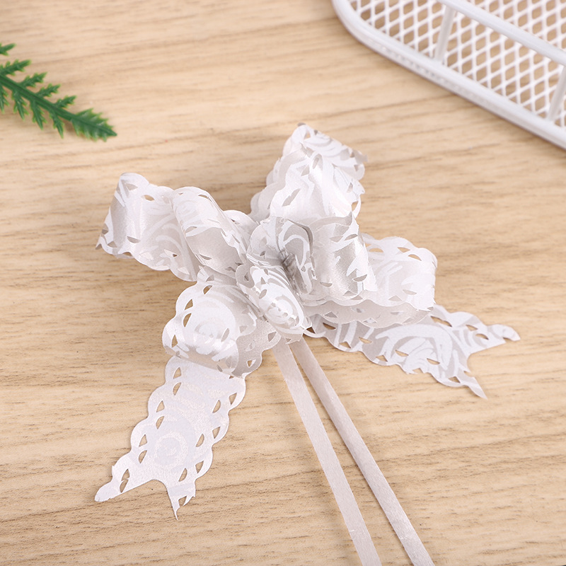 Comercio exterior Venta caliente 18 impreso encaje arco mano-Tirado flor Navidad vacaciones regalo embalaje tirar flor multicolor multi-patrón