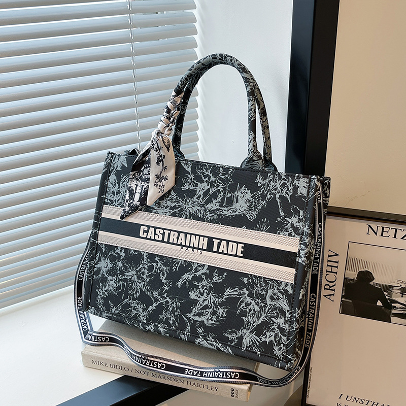 Bolsos de lona transfronterizos bolsos de mujer 2025 nueva moda retro letras impresas bolsos de hombro de gran capacidad