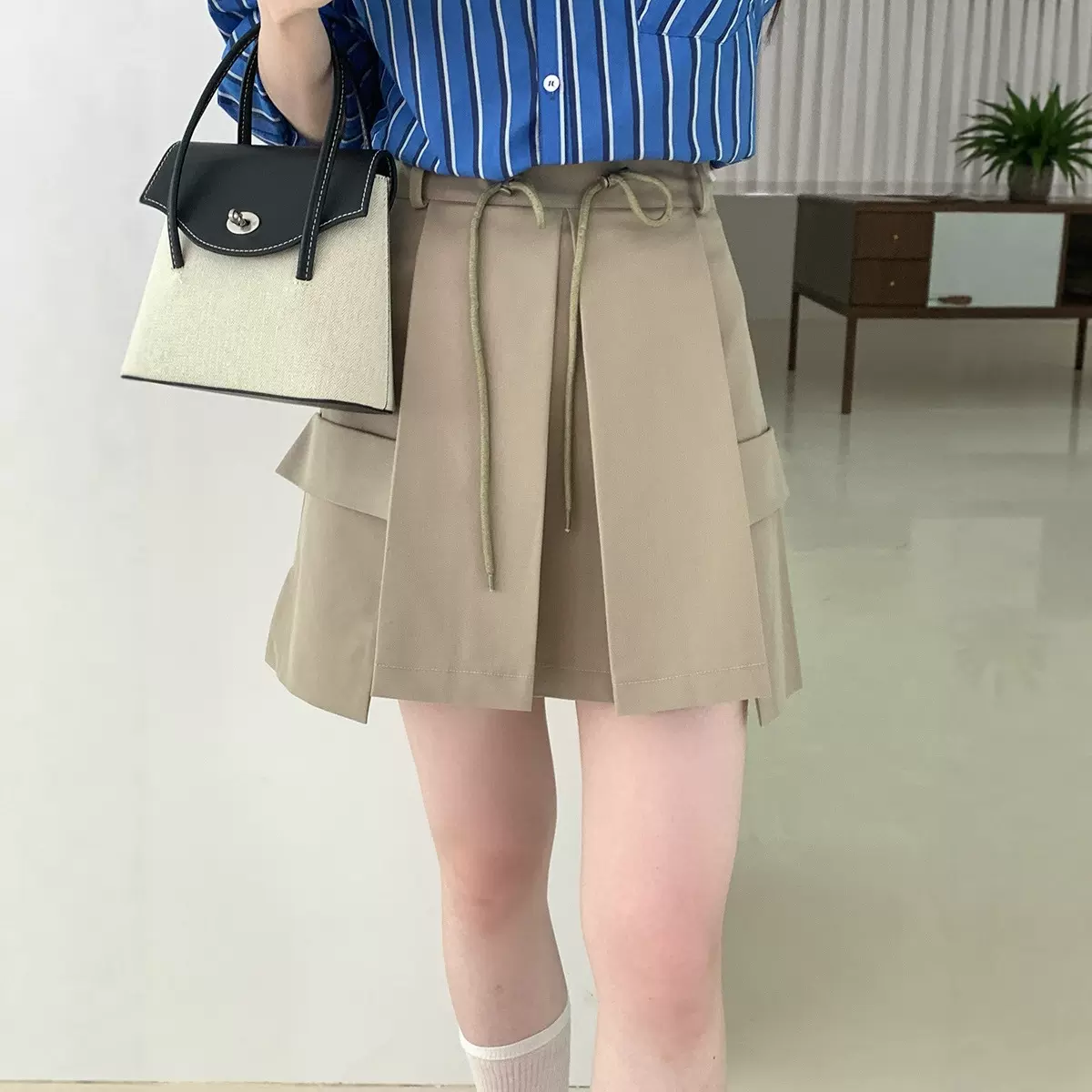 韩国东大门平替设计感高低落差短裙女2025秋季新款高腰a字半身裙