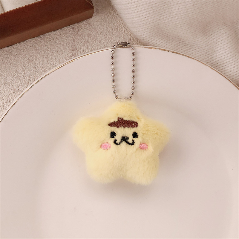 Nuevo estilo de felpa linda de dibujos animados arco estrella muñeca colgante monedero felpa auricular estuche llavero colgante