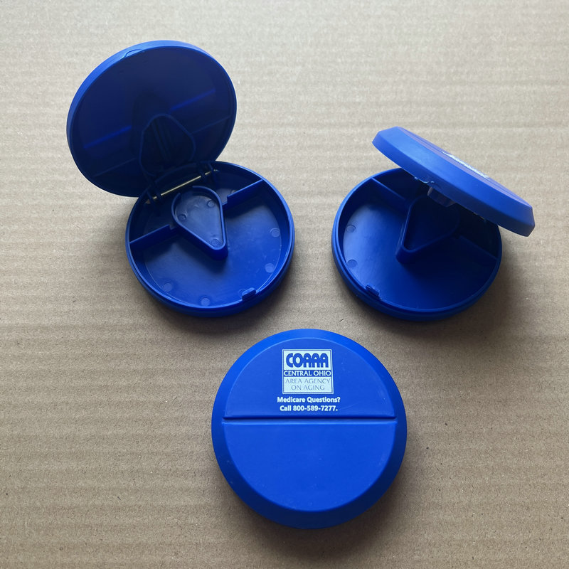 热销美国带刀片储药盒 扁圆形可切分割药盒 圆扁形分割药片药盒