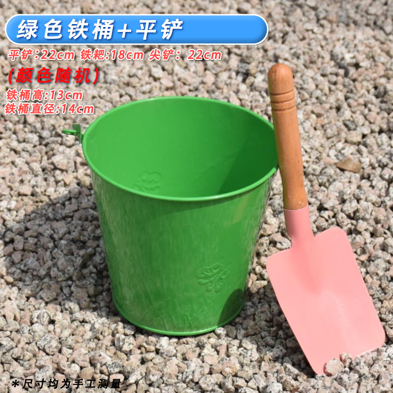 One green iron bucket + one small flat shovel