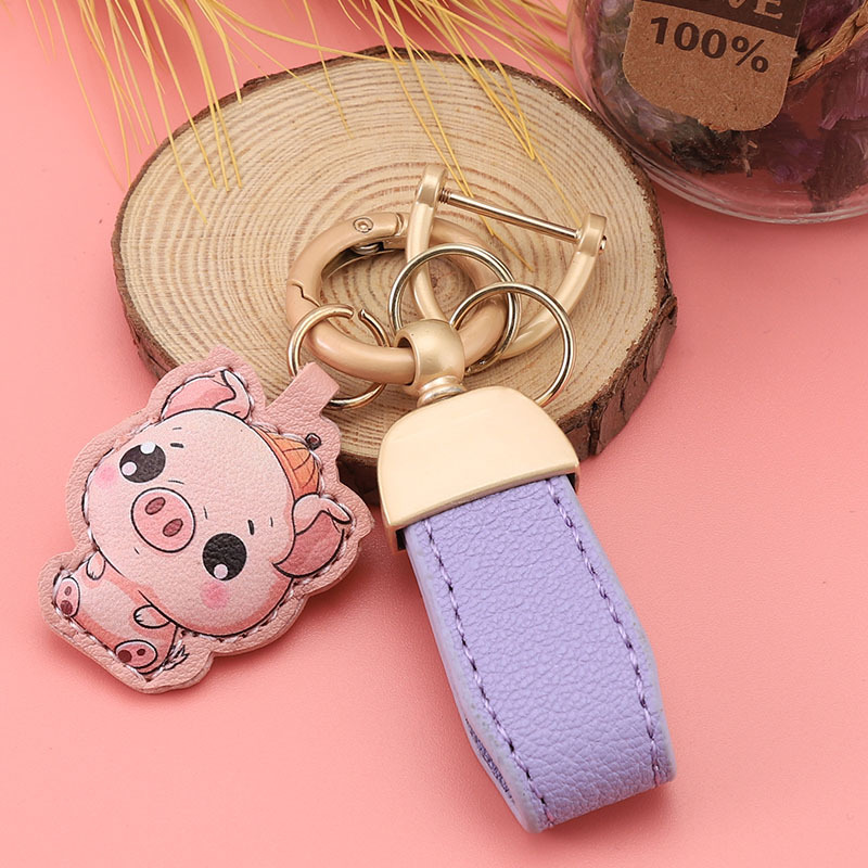 Nuevo llavero de piel de cordero francés pequeño llavero fresco colgante mini bolso corto colgante pequeño joyería