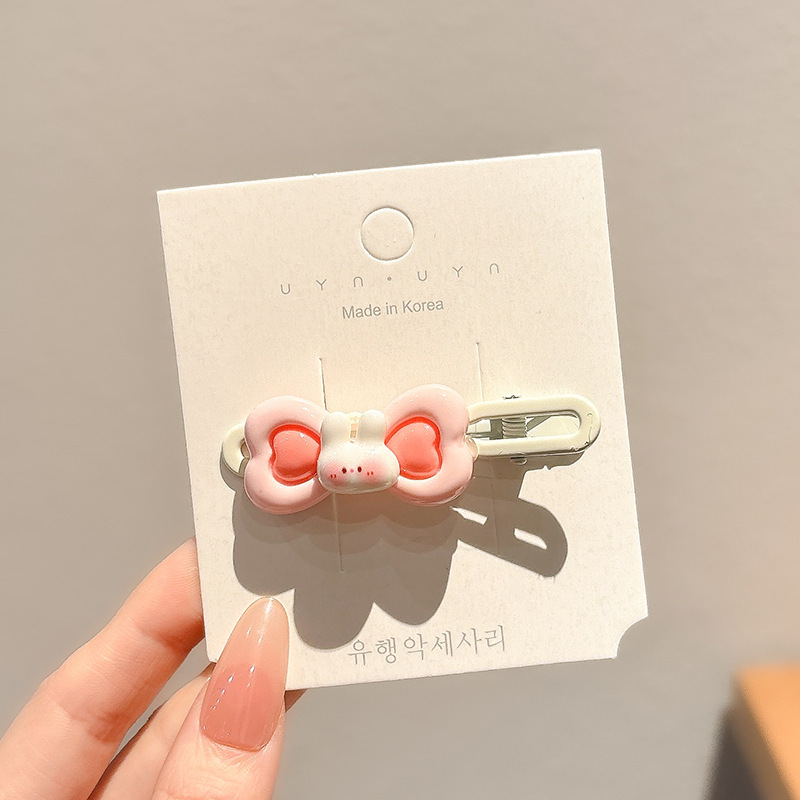 La nueva horquilla de dopamina rosa, la horquilla de flequillo lateral de alta calidad, los accesorios para el cabello de principios de primavera dulces y lindos, la pinza lateral de todo fósforo