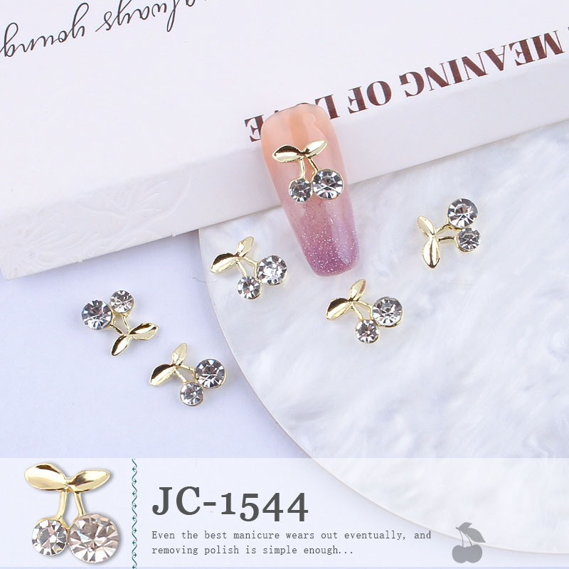 Venta caliente transfronteriza joyería de uñas al por mayor goteo cereza aleación diamante verano lindo fresco Super flash clavo diamante