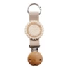Apricot color (wooden hat clip with holes) off-white bottom edge (round piece)