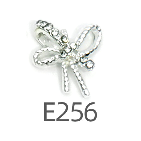 Transfronterizo Japonés arco de uñas accesorios de pajarita caliente simple todo fósforo tridimensional hueco joyería de uñas de diamantes al por mayor