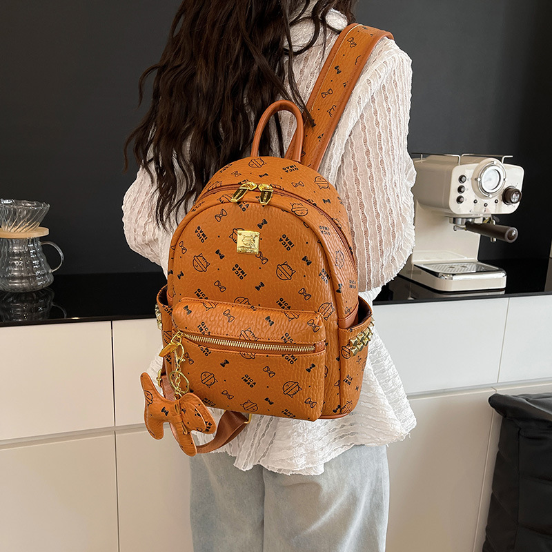 2025 nuevas mochilas escolares para estudiantes universitarias, lindos gatitos, mochilas para damas, bolsos de comercio exterior de gran capacidad para el trabajo y los desplazamientos