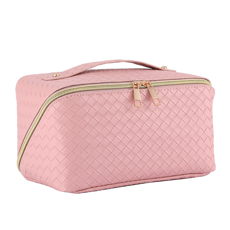 Bolsa de cosméticos de almohada tejida transfronteriza bolsa de almacenamiento de viaje portátil de gran capacidad portátil de cuero