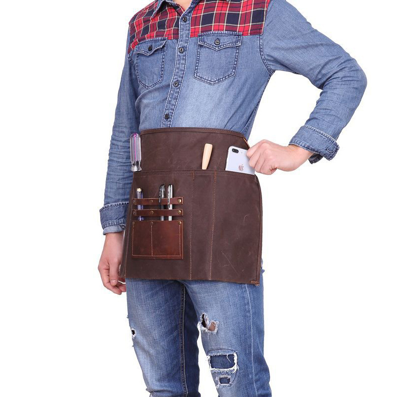 Amazon transfronterizo de lona encerada delantal de la vendimia de cuero de LA PU bolsillo electricista carpintería ropa de trabajo delantal impermeable al por mayor