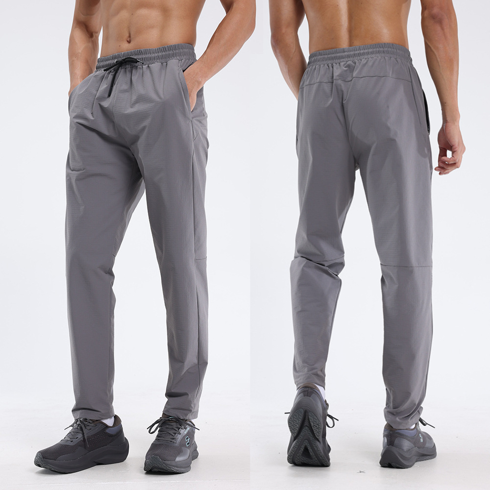 Dijia Running Sports Pantalones de entrenamiento para hombres, pantalones de tejido transpirables y rápidos, pantalones casuales impermeables y húmedos.