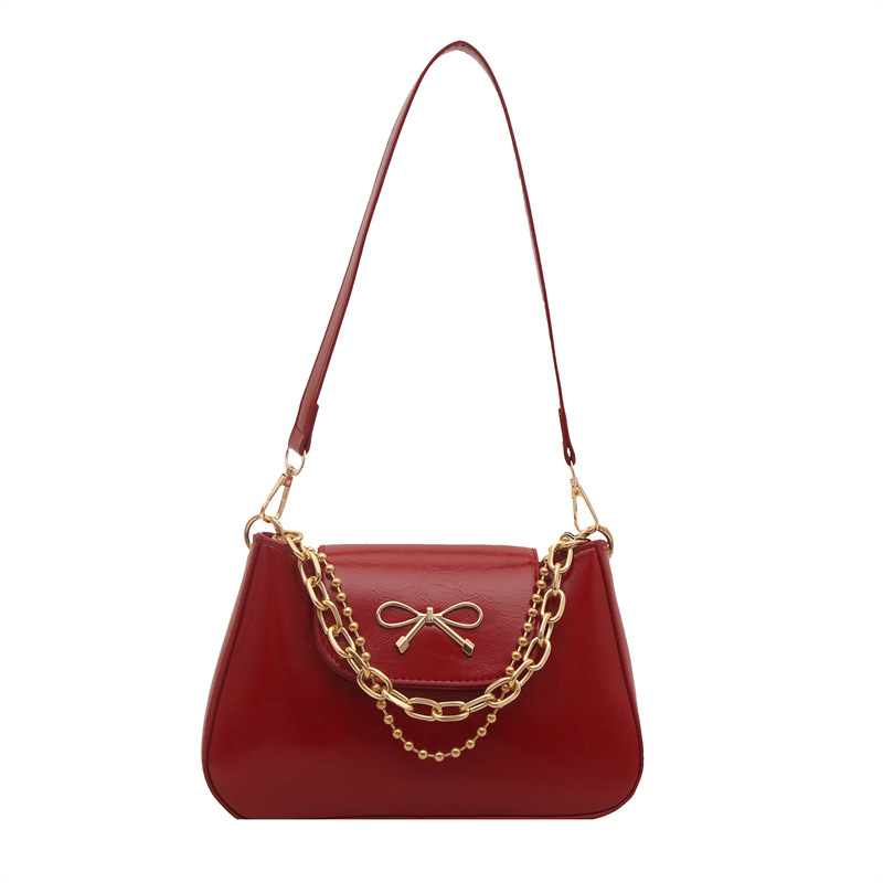 2025 nuevo estilo de color sólido tendencia primavera casual bowknot cadena de mujer axila de un solo hombro bandolera mujer