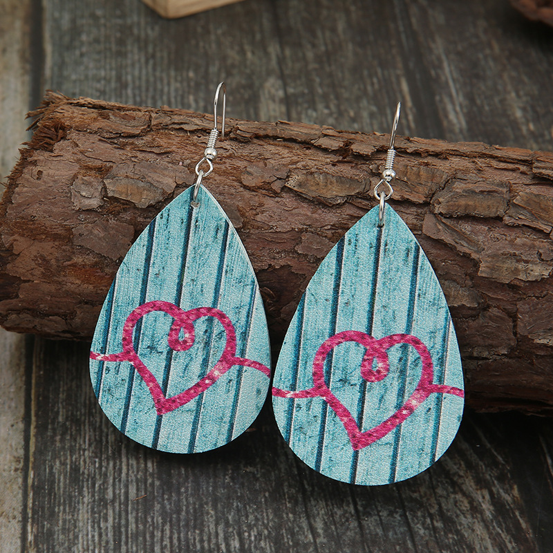 New Valentine's Day Retro Vertical Pattern Double-sided Leather Earrings Wholesale display picture 3