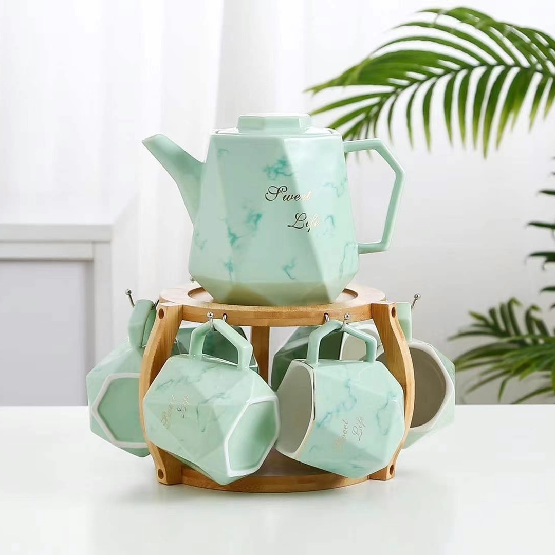 Estilo nórdico creativo conjunto de agua fría traje de cerámica taza con soporte Oficina flor tetera taza de agua marbling