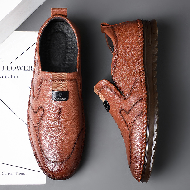 Primavera nueva capa superior de piel de vaca zapatos casuales de los hombres de fondo suave papá zapatos de cuero de los hombres al por mayor hecho a mano solo zapatos de los hombres