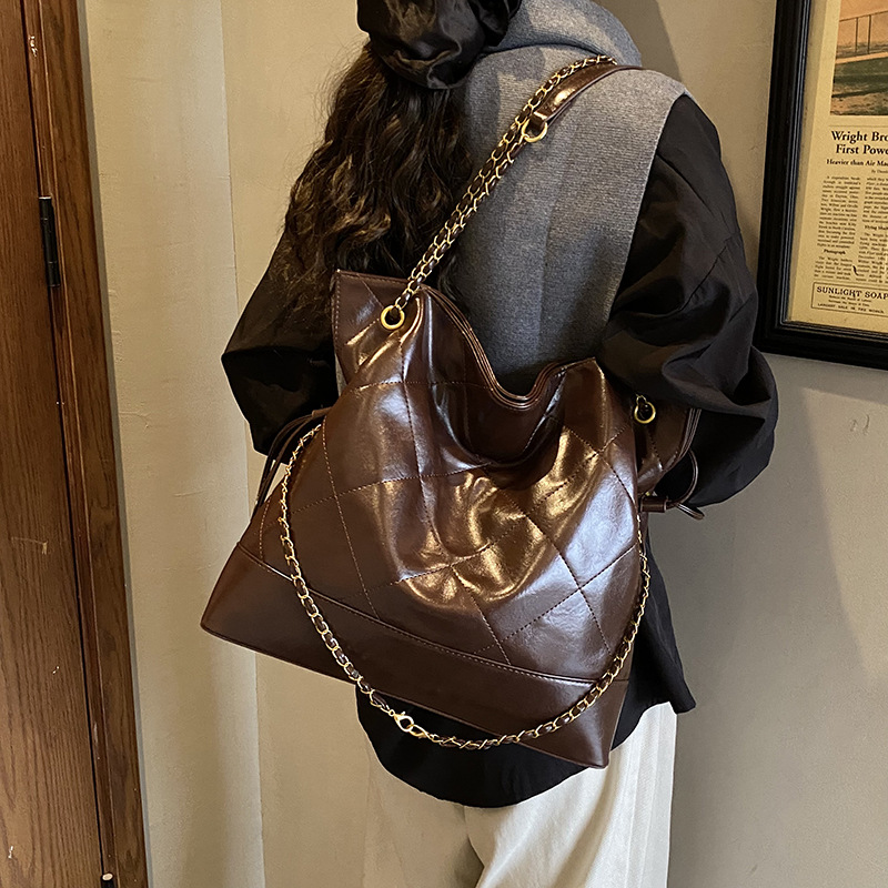 Bolsa de hombro de viaje coreano, cadena de cuadrícula, bolsa de tote universal para mujeres 2025, nueva mochila casual de tres usos