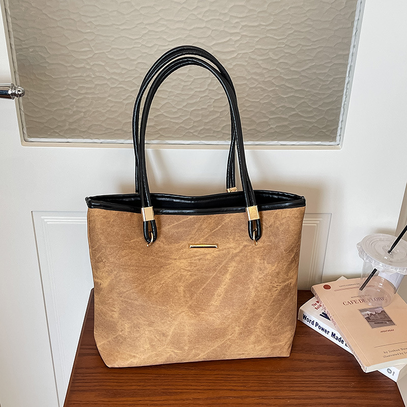 2026 nuevo retro de gran capacidad bolso de mano de hombro para mujeres de alta calidad sensación de viaje bolso de moda versátil bolso simple
