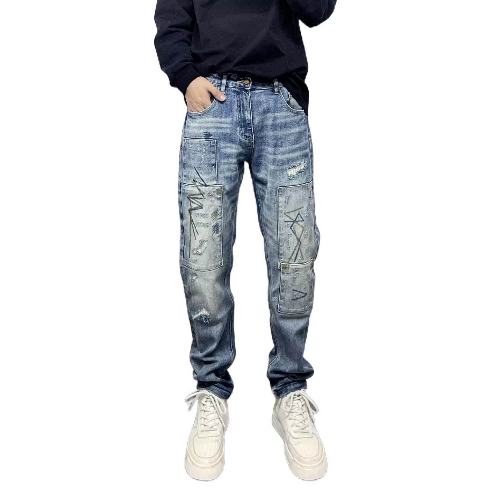 Jeans slim stretch da uomo con strappi patch e ricami_voghion.com