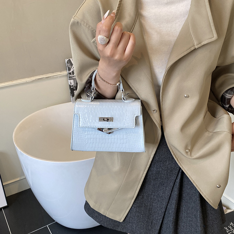 Bolsos de piedra de alta calidad para mujeres 2025, nuevos bolsos de moda portátiles de invierno versátiles mochila de viaje