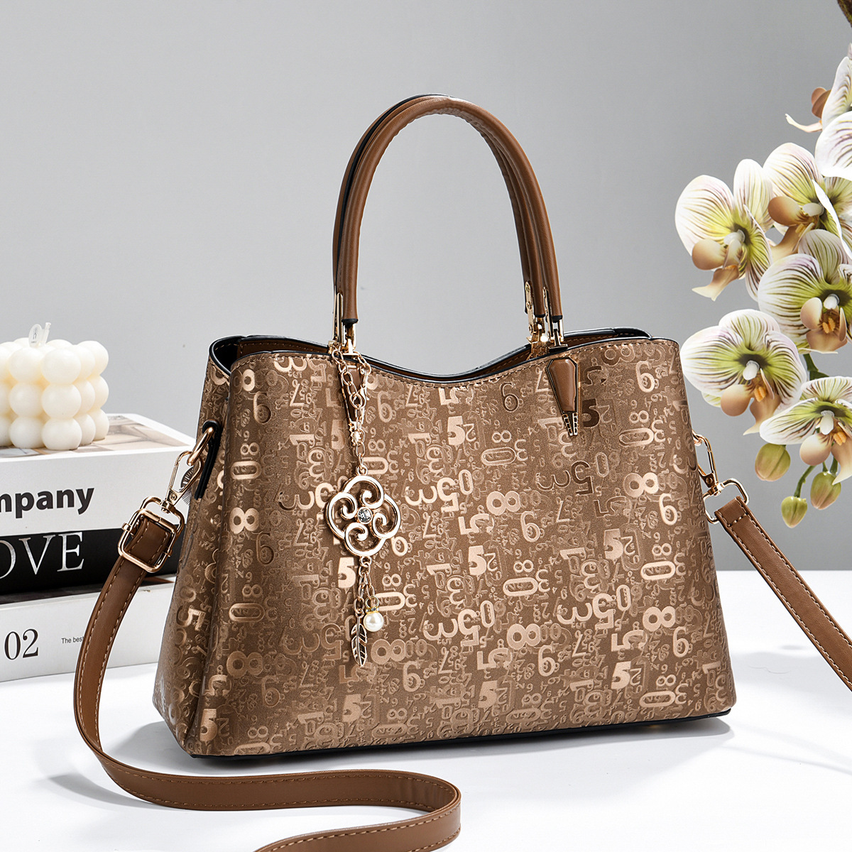 2026 nuevo estilo de moda alta bolsa de mano de moda para mujeres de viaje universal bolsa de hombro de mujer regalo del día de la madre