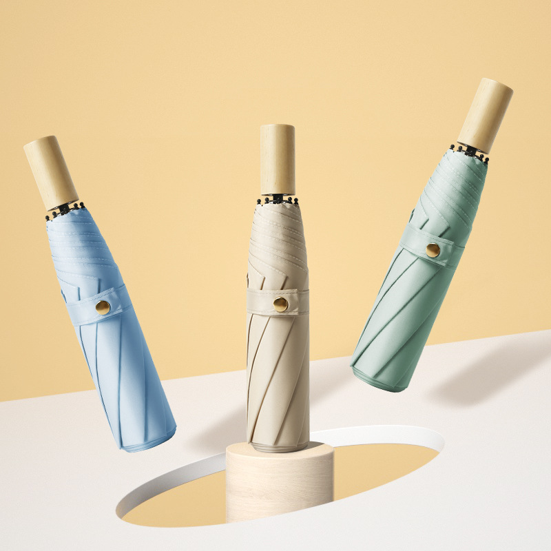 外贸爆款加厚防水面料防风三折伞简约纯色晴雨两用女手动折叠雨伞