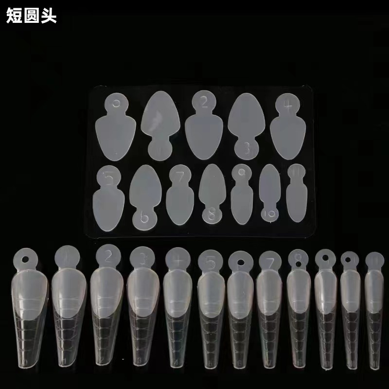 Molde de película de uñas de cristal de uñas popular transfronteriza sin pegamento de extensión de soporte de papel 12 piezas de molde de uñas pegatinas francesas no tallado de silicona de molienda