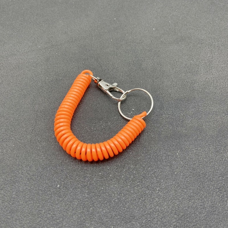キャンディー色の高弾プラスチックは電話線のスプリングロープのキーチェーンをなくして携帯電話のカードカバーストラップのキーチェーンを包みます。|undefined