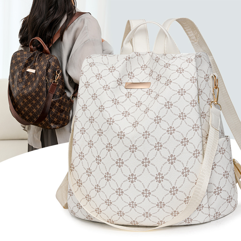 Mochila de mujer antirrobo floral de nuevo estilo, mochila de gran capacidad de todo fósforo de moda, bolso multifuncional de viaje ligero para mujer